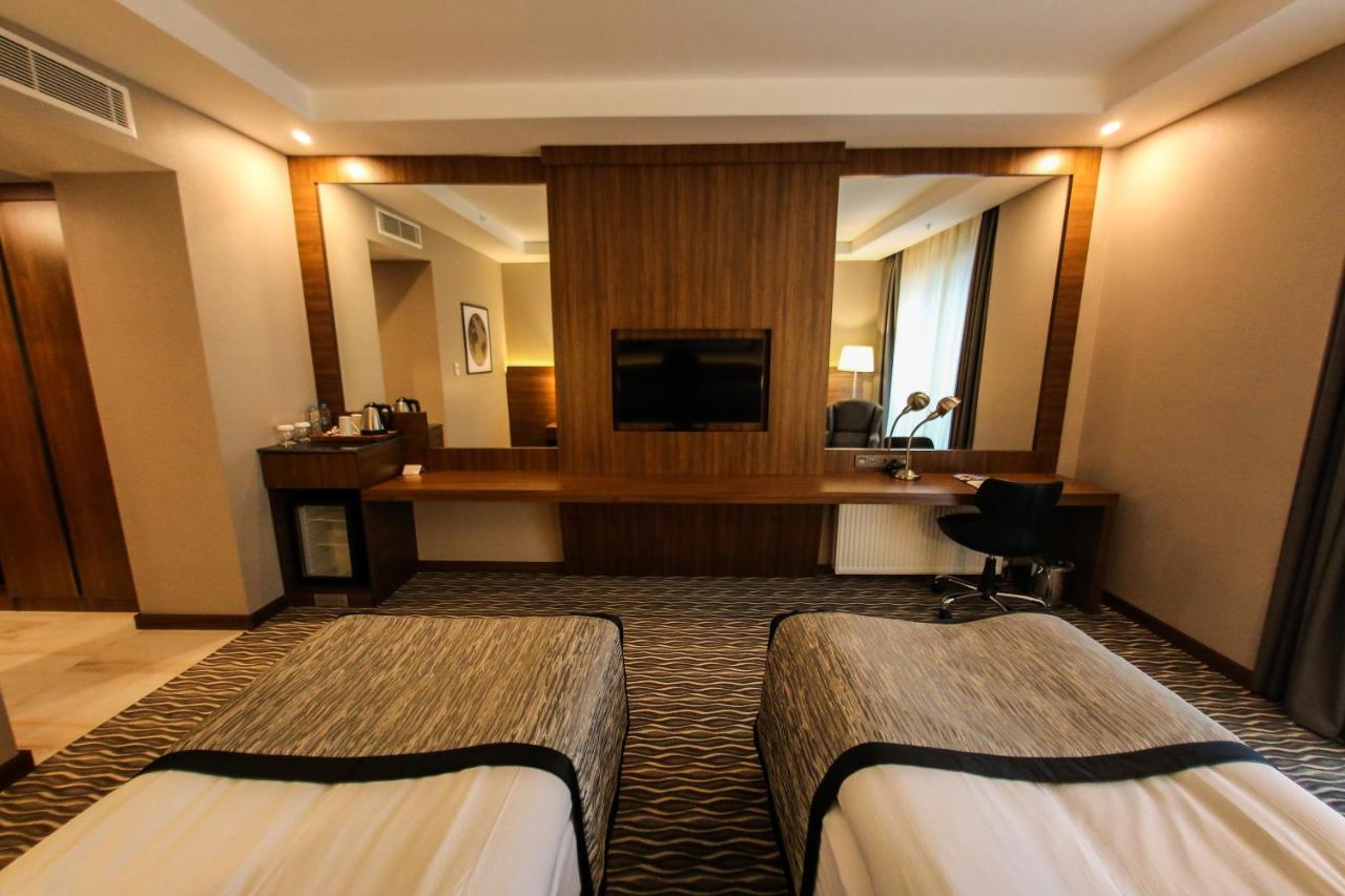 Hotel Ramada By Wyndham Nigde Extérieur photo